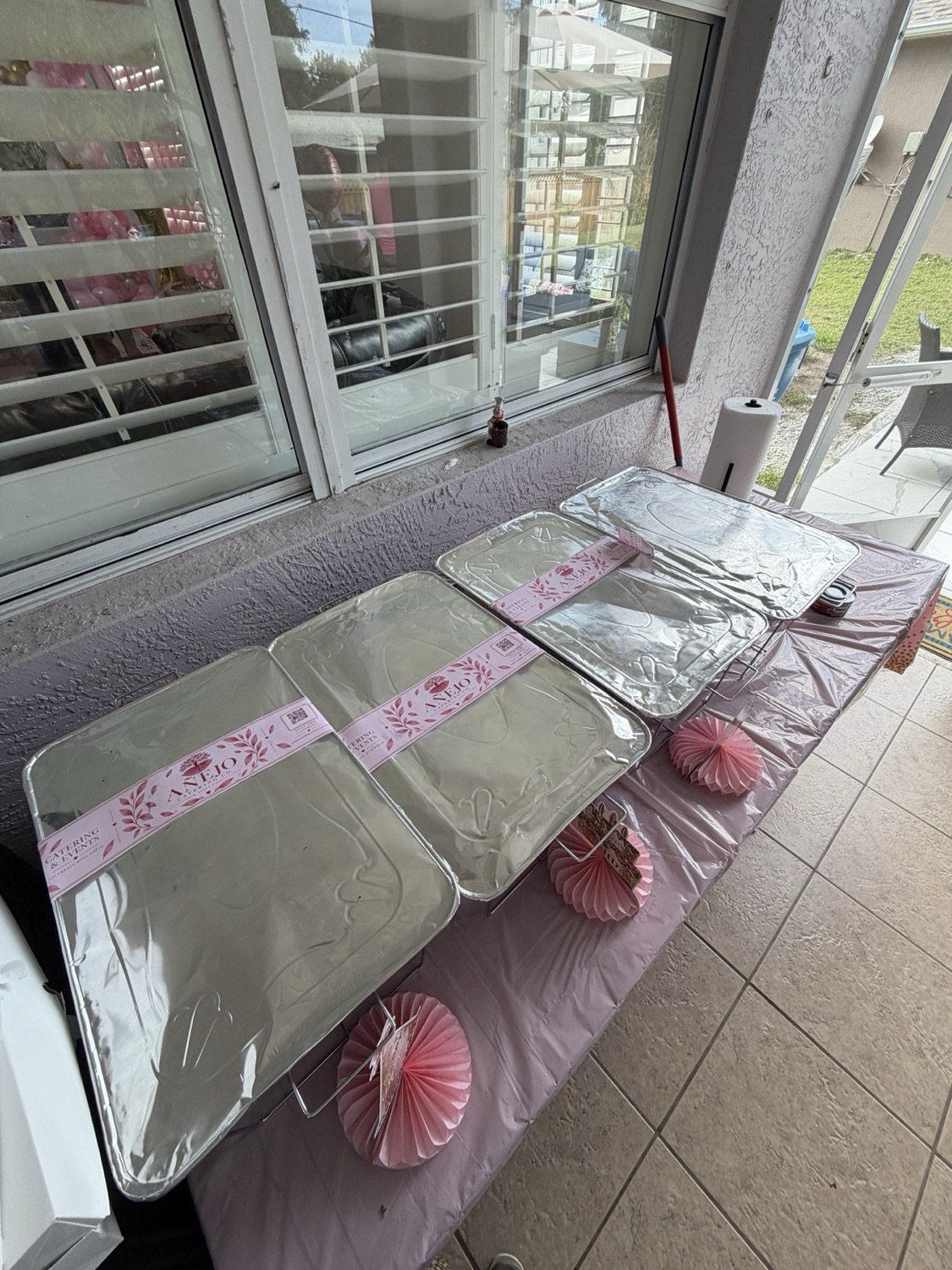 Añejo hot catering trays coordinated with the pink event theme