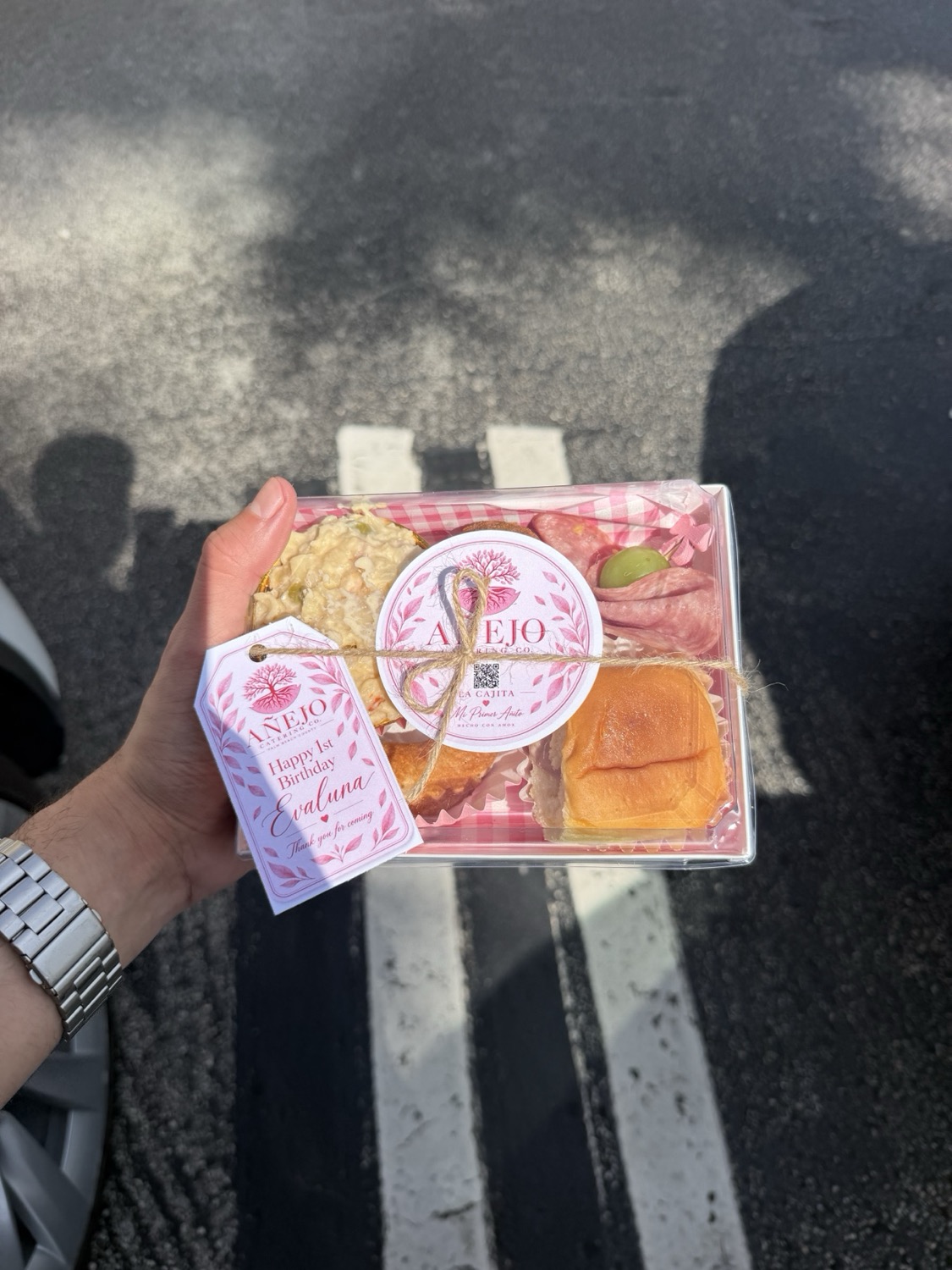 Personalized Cajita held at the first-birthday event